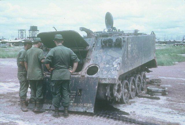 The destructive force of a mine is evident in this photo of a destroyed ACAV.