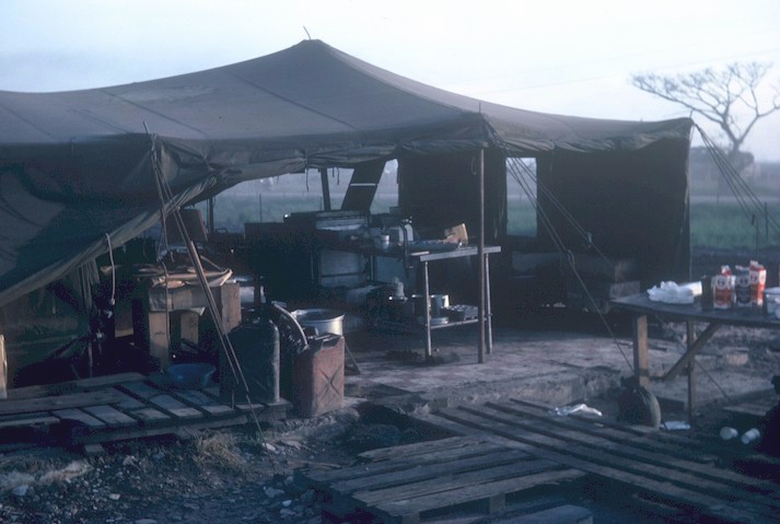 Mess tent on an old tiled foundation.